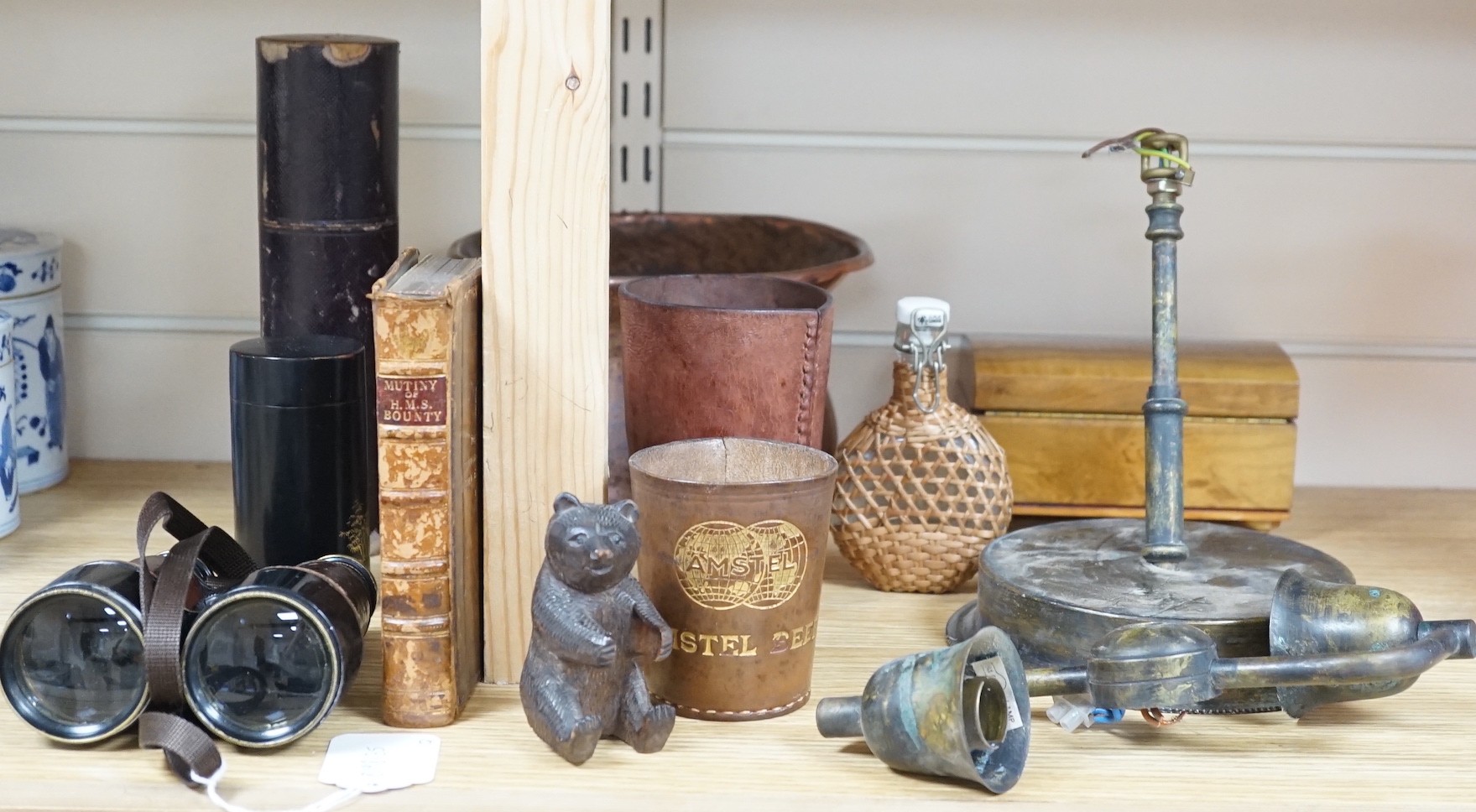 A quantity of collectables including a pair of Dolland of London binoculars, a Black Forest bear carving, a copper jardiniere, an olive wood jewellery box etc.